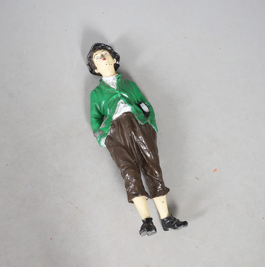AN EARLY 20TH CENTURY PAINTED METAL ADVERTISING (?) FIGURE OF A BOY, CIRCA 1920. — Miscellaneous — Lawrences Auctioneers