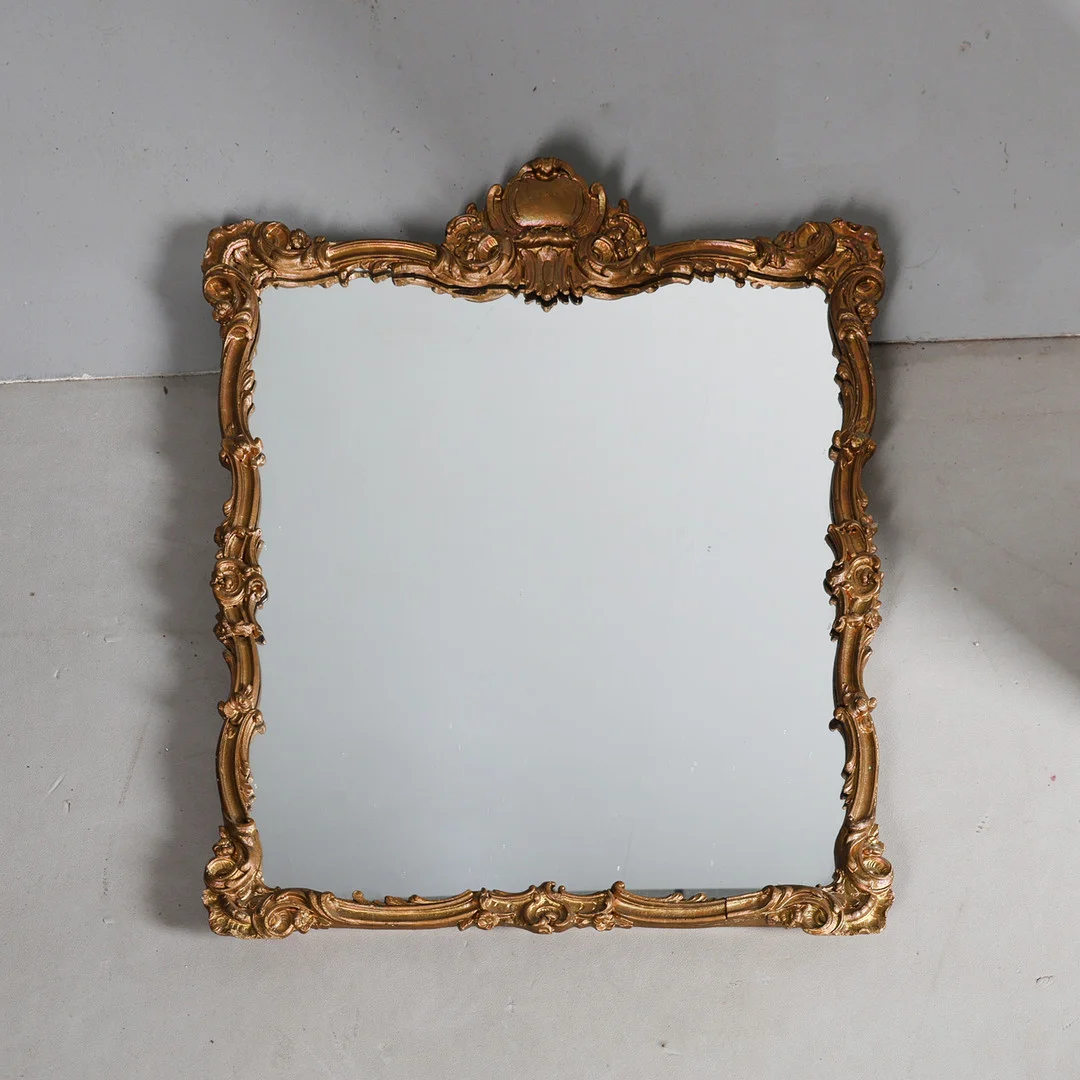 A GILT GESSO WALL MIRROR. — Mirrors — Bishop & Miller
