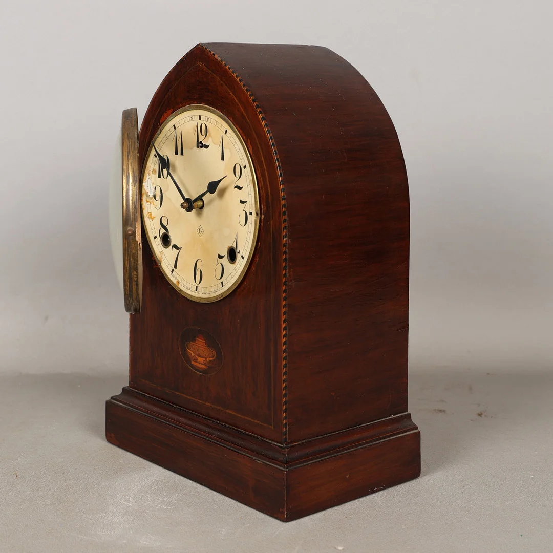 AN EDWARDIAN MAHOGANY INLAID MANTEL CLOCK BY L. GILBERT CLOCK CO. — Mantel clocks — Bishop & Miller