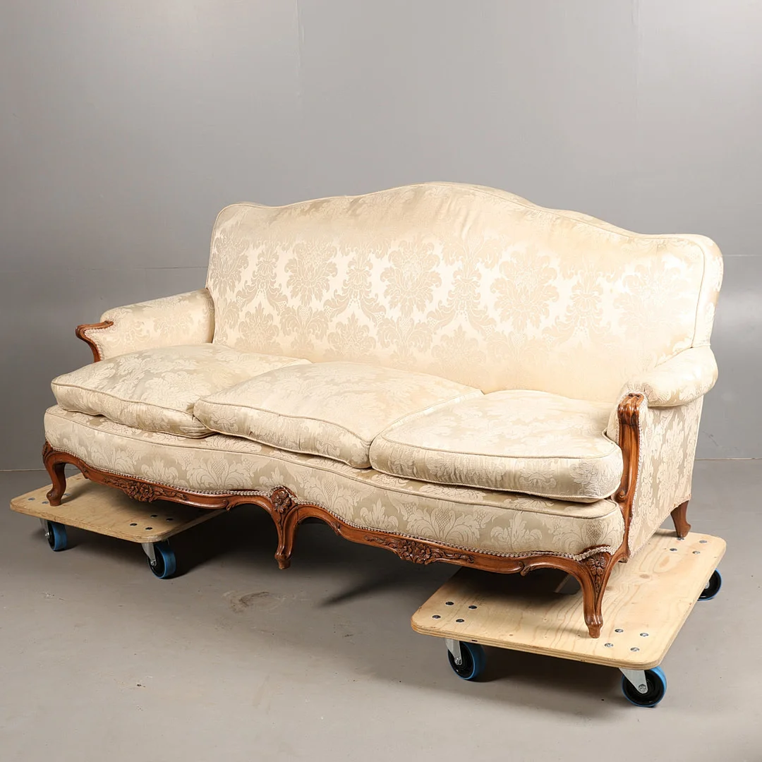 A FRENCH STYLE THREE SEATER SOFA. — Sofas & Seatings — Bishop & Miller