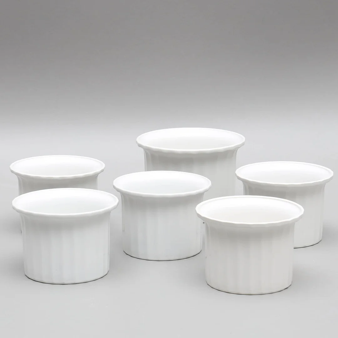KARIN BJÖRQUIST. Ytterfoder, 6 delar, porslin, "Interflora", Gustavsberg. — European — Auktionsmagasinet Vänersborg