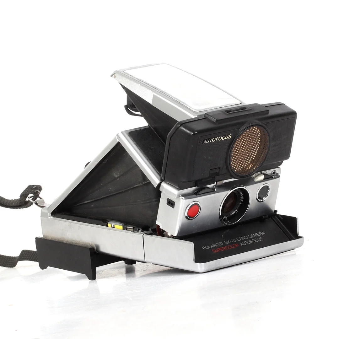 POLAROIDKAMERA, SX-70 Land Camera, Supercolor, AutoFocus. — Cameras & accessories — Stadsauktion Sundsvall