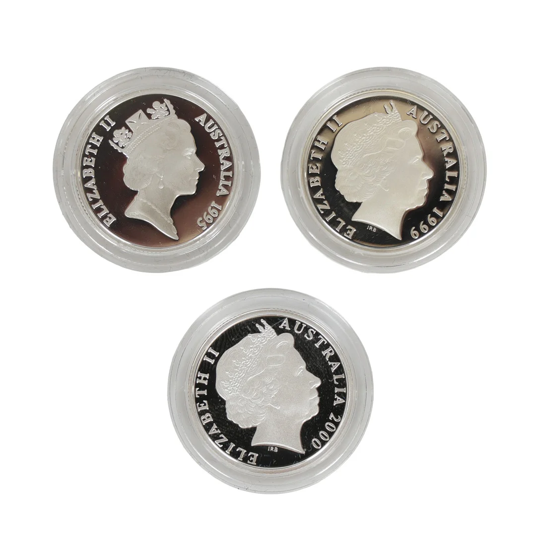 THREE SILVER ONE DOLLAR PROOF COINS (3). — Coins & Banknotes — Bishop & Miller
