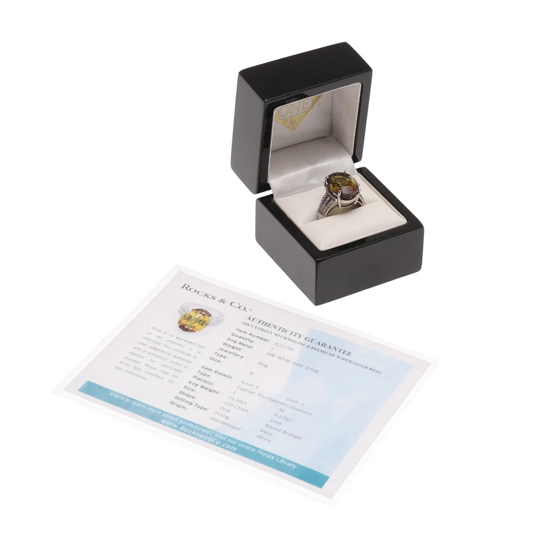 A CUPRIAN TOURMALINE AND DIAMOND RING. — Rings — Lawrences Auctioneers