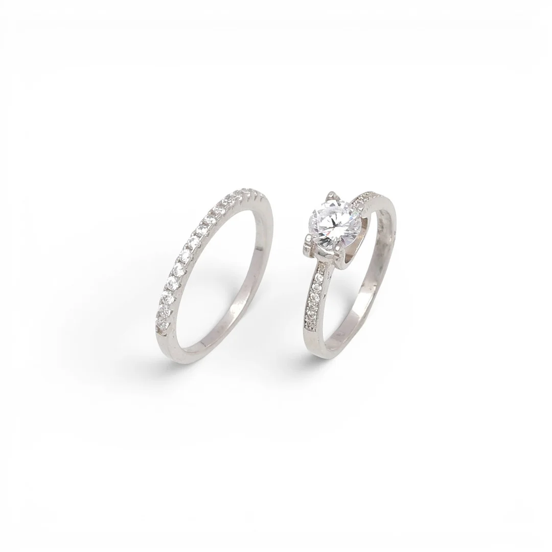 Solitaire ring and half-band ring with zircons. — Rings — Balclis