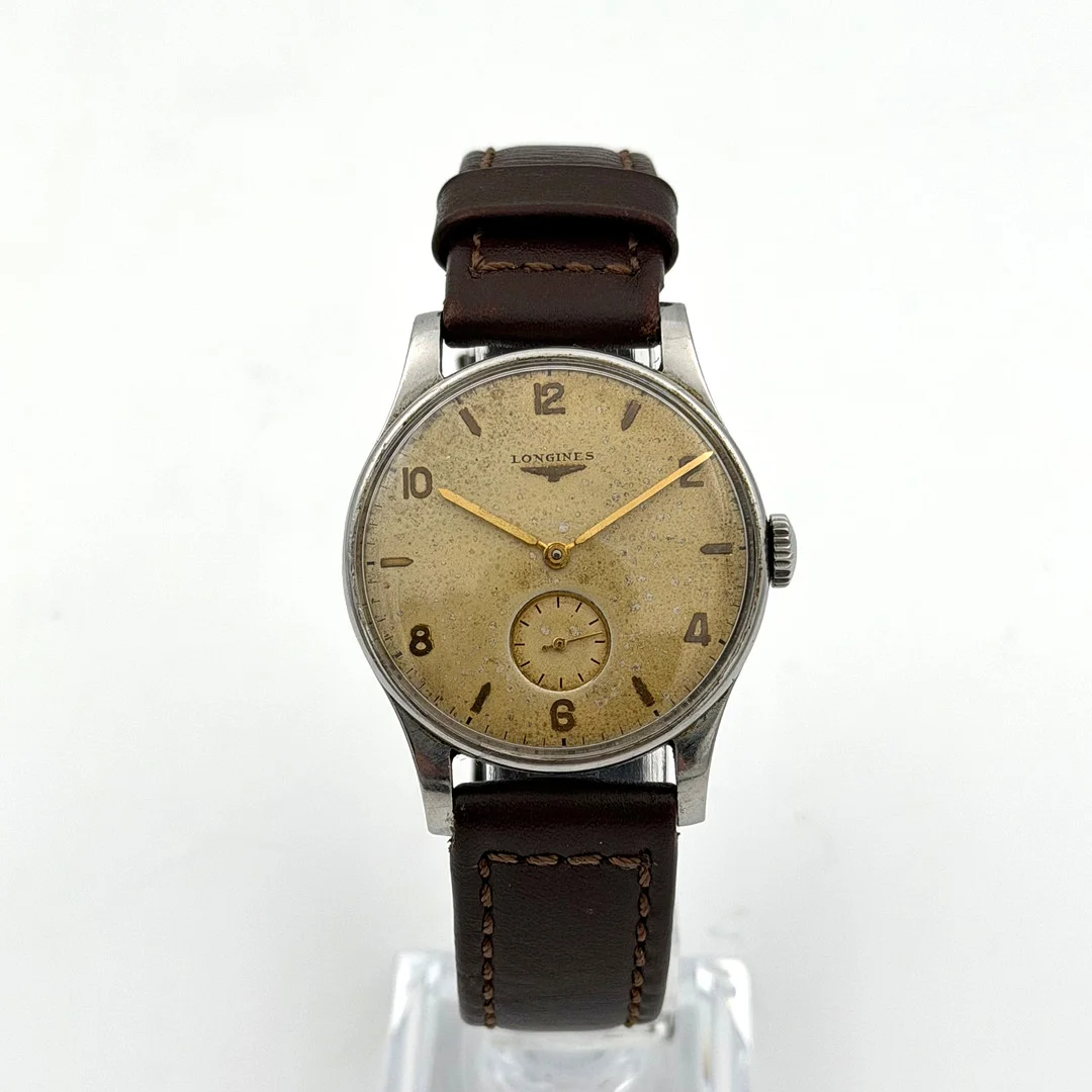 LONGINES, armbandsur, 1940/50-tal, manuell, stål. — Wristwatches — Skandia Auktion