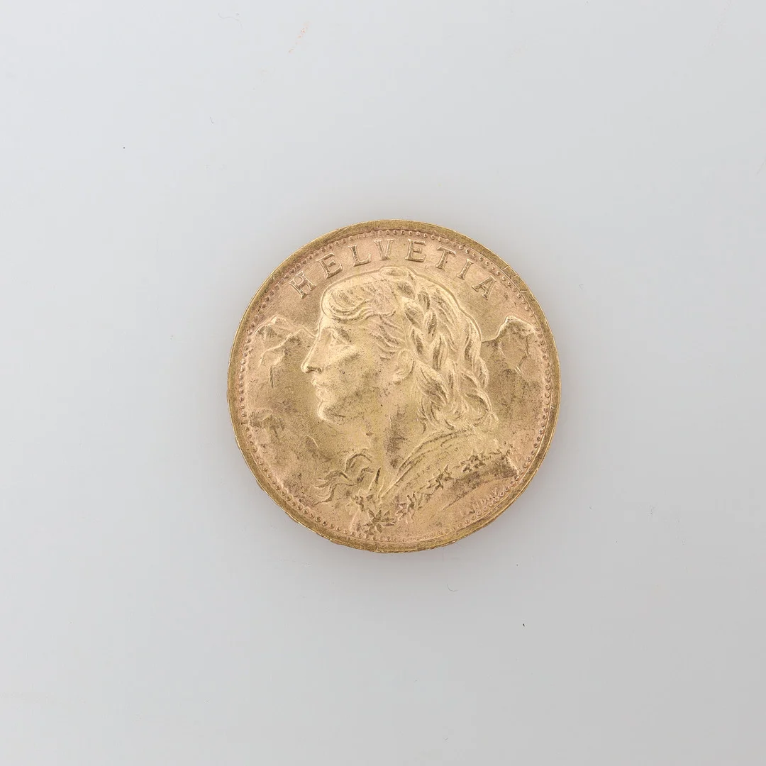 GULDMYNT ,Helvetia 20Fr 1935, 21,6K bruttovikt ca 6,4 gram. — Coins & Banknotes — Borås Auktionshall