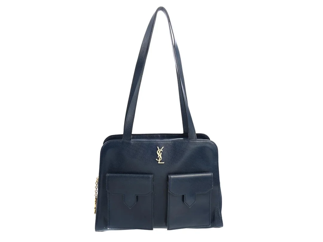 VÄSKA, SANIT LAURENT, vintage, marinblått läder, guldfärgade beslag, Logo YSL, 33x23x8 cm. — Accessoarer/Väskor — Kaplans