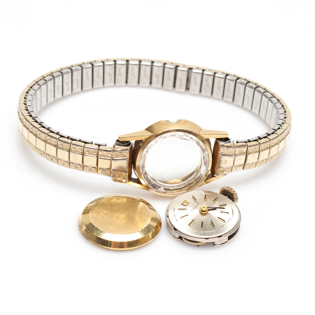 ARMBANDSUR/SKROT, 18K, Tissot, guld, vikt bakboett 1,7gram. — Wristwatches — Gomér & Andersson Linköping