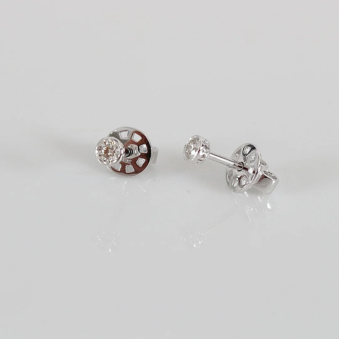 ENSTENSÖRHÄNGEN, 0,16ct, vitguld 18K. — Earrings — Halmstads Auktionskammare