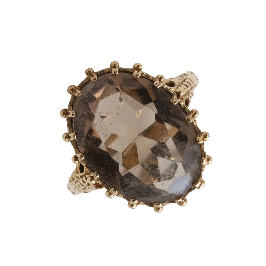 A SMOKY QUARTZ SINGLE STONE RING. — Rings — Lawrences Auctioneers