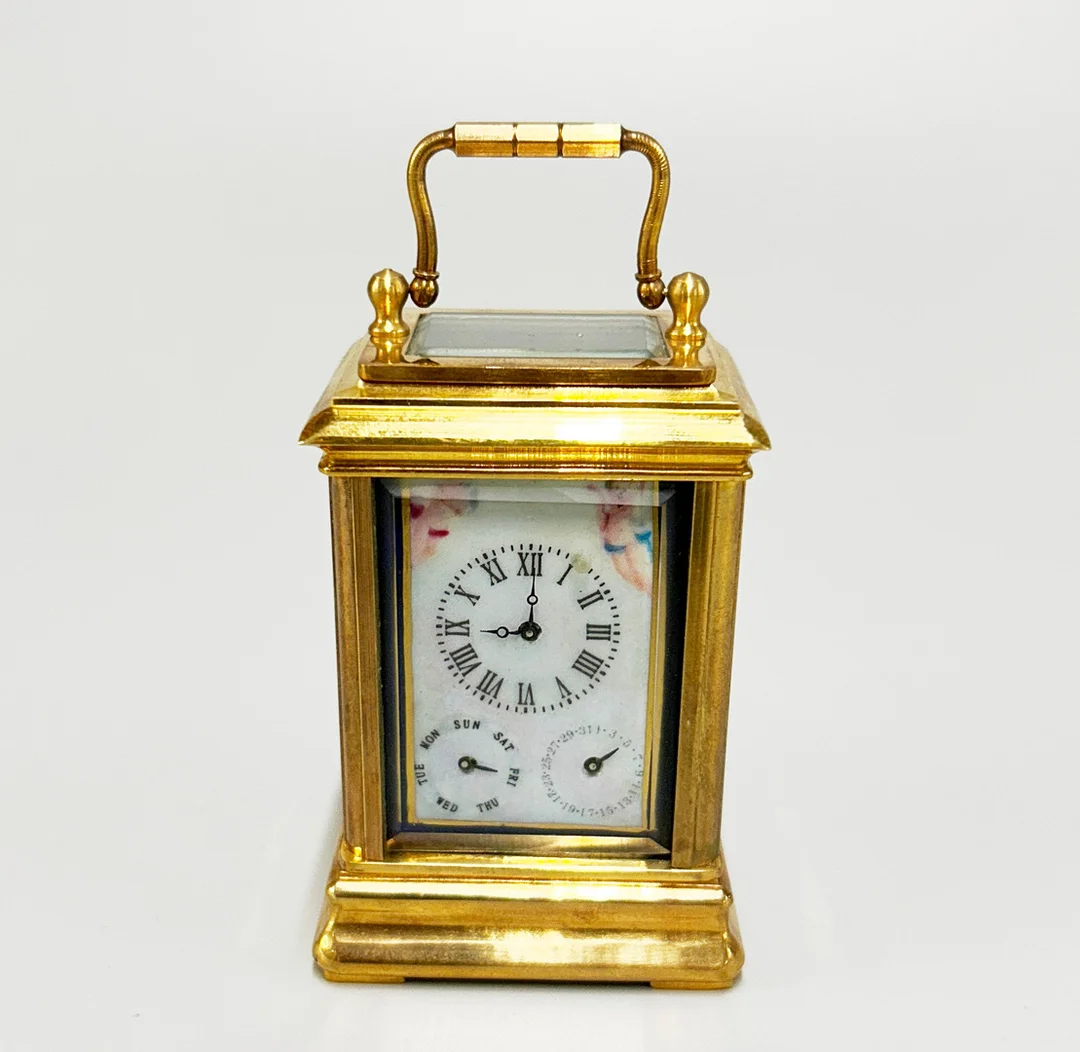 CHERUB CARRIAGE CLOCK. — Carriage & Miniature Clocks — Chalkwell Auctions