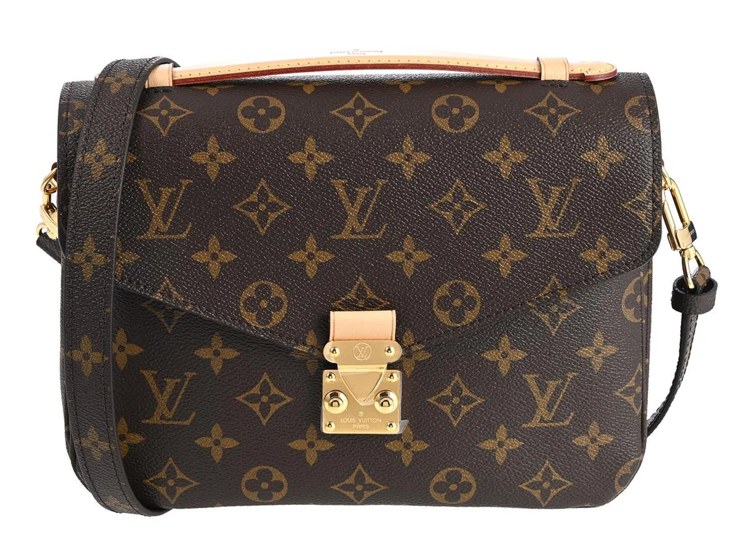 LOUIS VUITTON, VÄSKA, Pochette Métis, Monogram Canvas, guldfärgade beslag, 24,5x17x5 cm, märkt DR4137, år 2017, originalkvitto från 2017, avtagbar axelrem, dustbag, originalkartong, plast kvar på beslag. Excellent Condition. — Accessoarer/Väskor — Kaplans