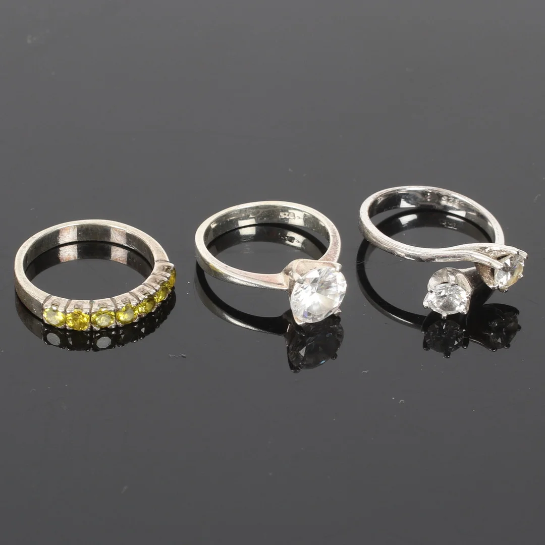 RINGAR, 3 st. Sterling silver, med vita och gula stenar. 1900-tal. — Rings — Stadsauktion Sundsvall