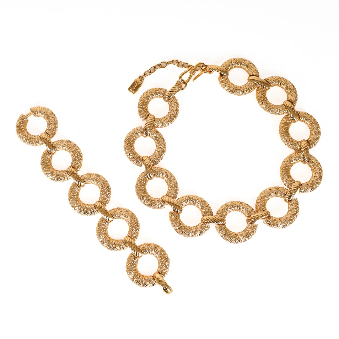 Yves Saint Laurent: Gold-plated necklace and bracelet set (2) — Jewellery/Jewellery sets — Lauritz