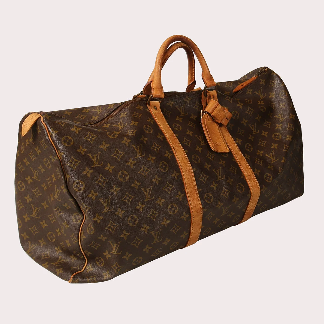 LOUIS VUITTON. Weekendväska, Monogram Canvas Keepall 60, Frankrike 1988. — Vintage & Designer Fashion — Limhamns Auktionsbyrå