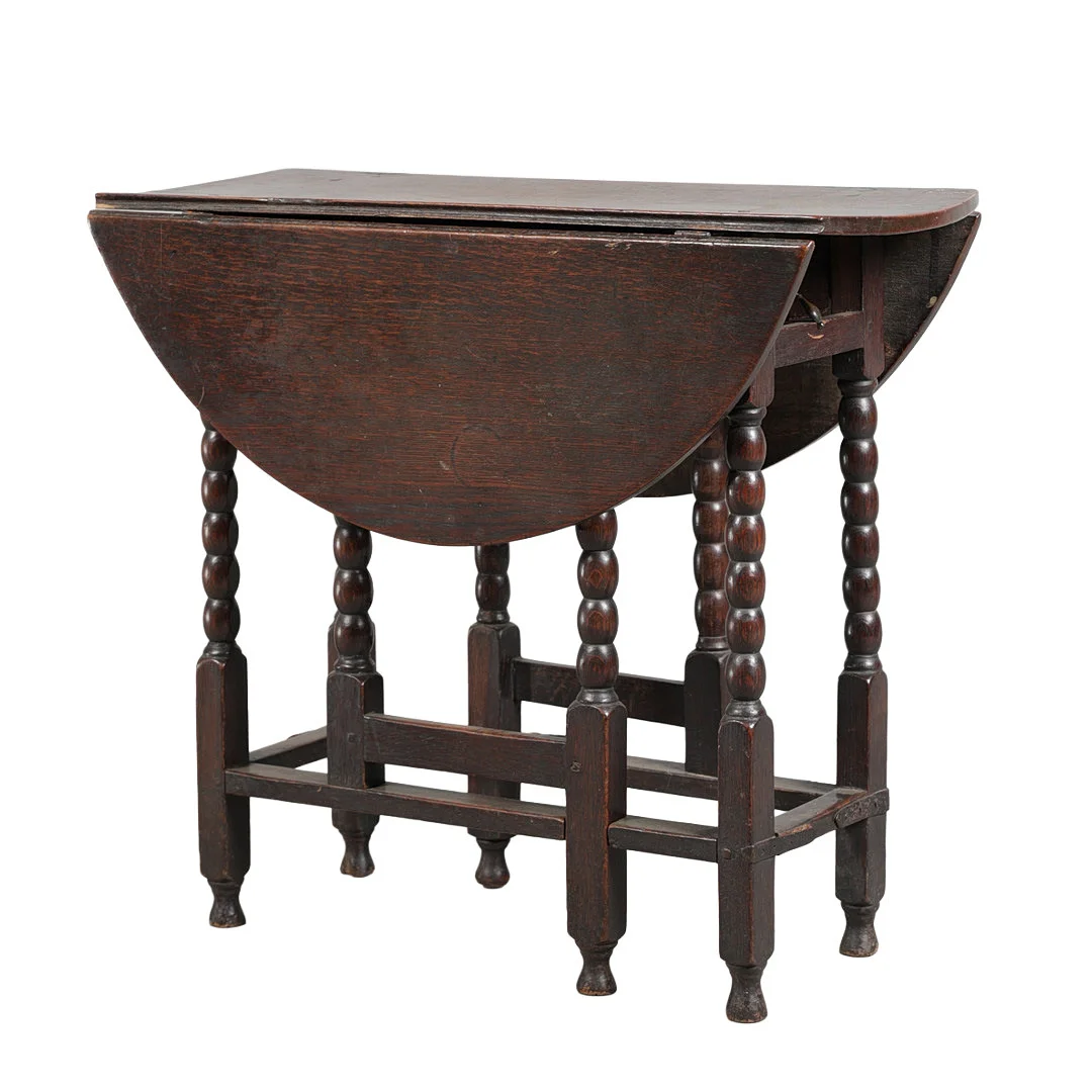 A SMALL CHARLES II OAK DROP LEAF GATE LEG TABLE, CIRCA 1680. — Tables — Bishop & Miller