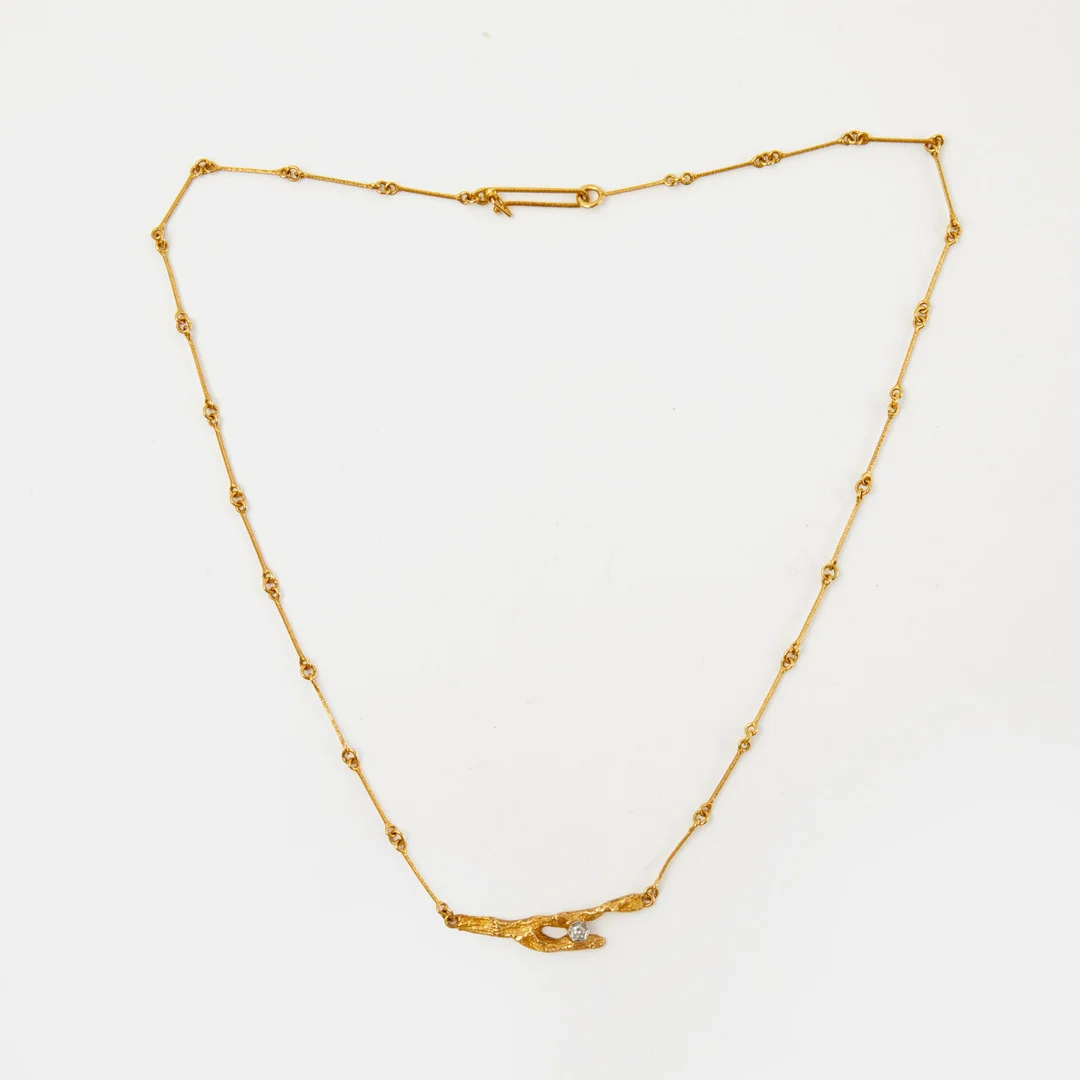 BJÖRN WECKSTRÖM. Collier, "Diamantknopp", 18K guld, åttkantslipad diamant, ca 0,02 ct enligt gravyr, Lapponia, 1991, Finland. — Necklace — Stockholms Auktionsverk Sickla