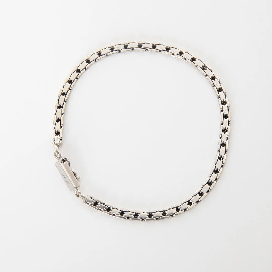 ARMBAND, 18K vitguld, Uno A Erre, Italien. — Bracelets — Auktionsverket Engelholm