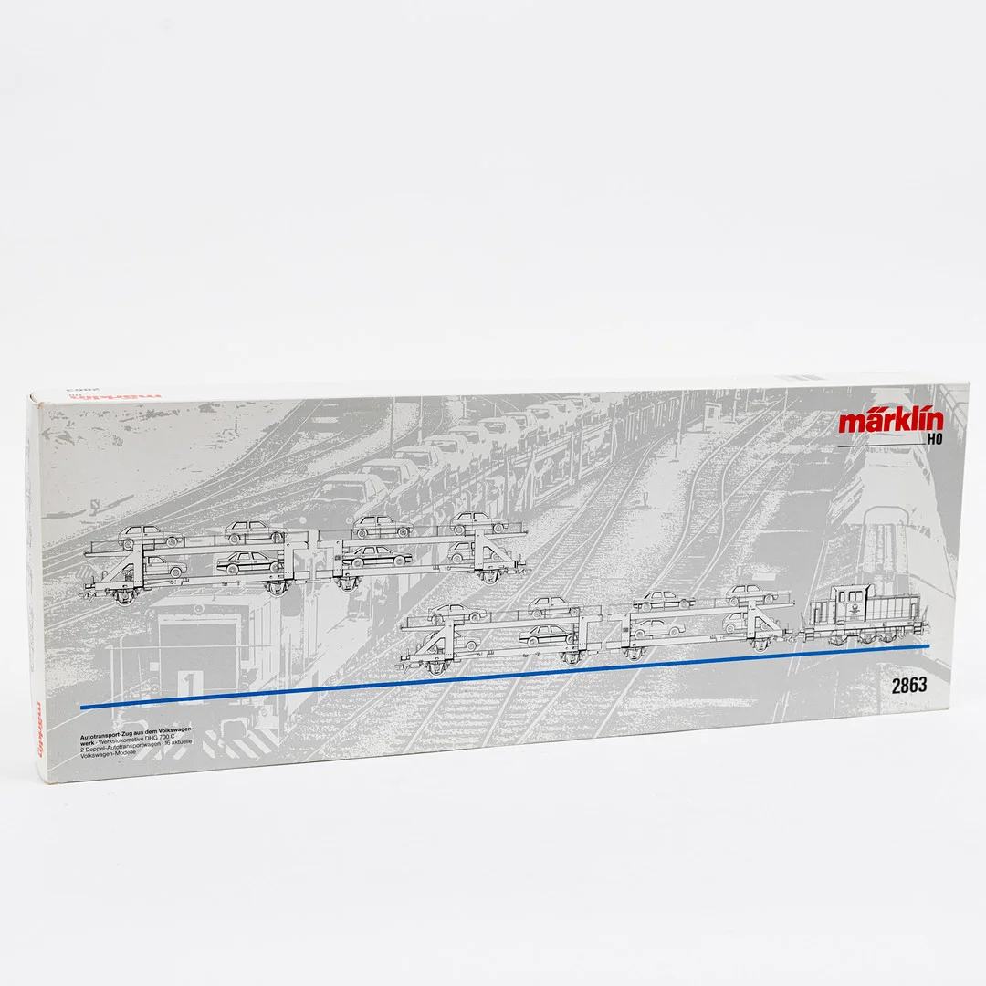 MÄRKLIN 2863 tågsats med litet diesellok, 2 biltransportvagnar och 16 tillhörande bilar märkta Herpa. instruktion. — Model railways — Auktionshuset Kolonn