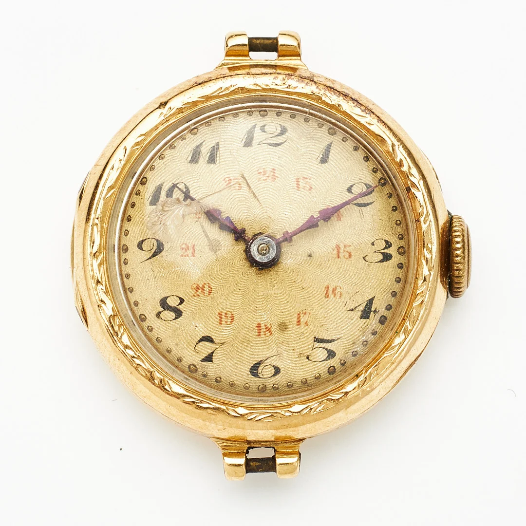 ARMBANDSUR, 18 k guld, manuell, plexiglas, guillocherad urtavla, arabiska siffror, 1920/1930-tal. — Wristwatches — Stockholms Auktionsverk Magasin 5