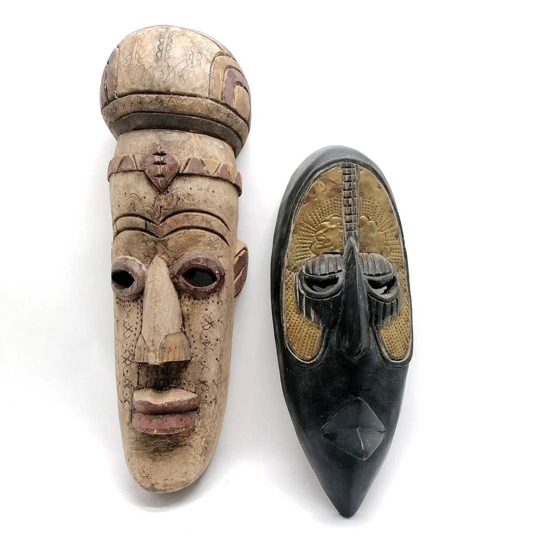 2 X HAND CARVED WOODEN TRIBAL MASKS. — African tribal art — Acreman St Auctioneers & Valuers