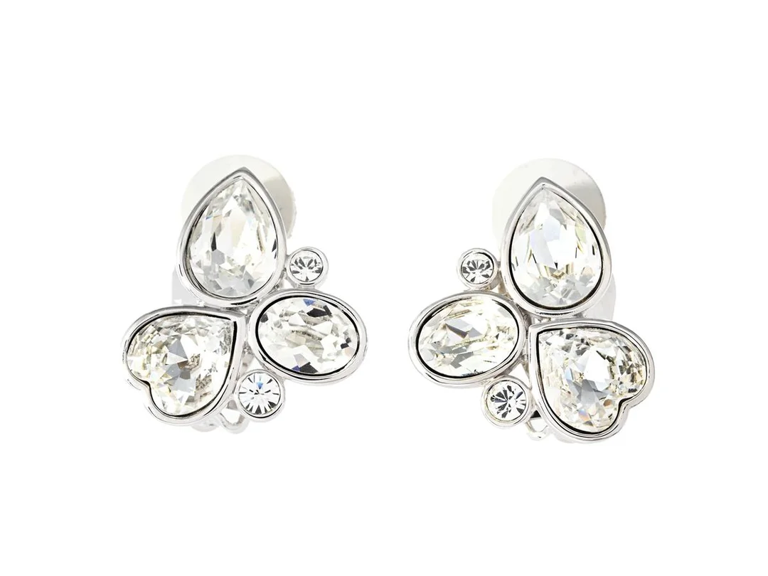SWAROVSKI, örhängen, vitmetall, Swarovski kristaller, höjd 21 mm, clips, vikt 12,5 g, etui. — Smycken/Örhängen — Kaplans