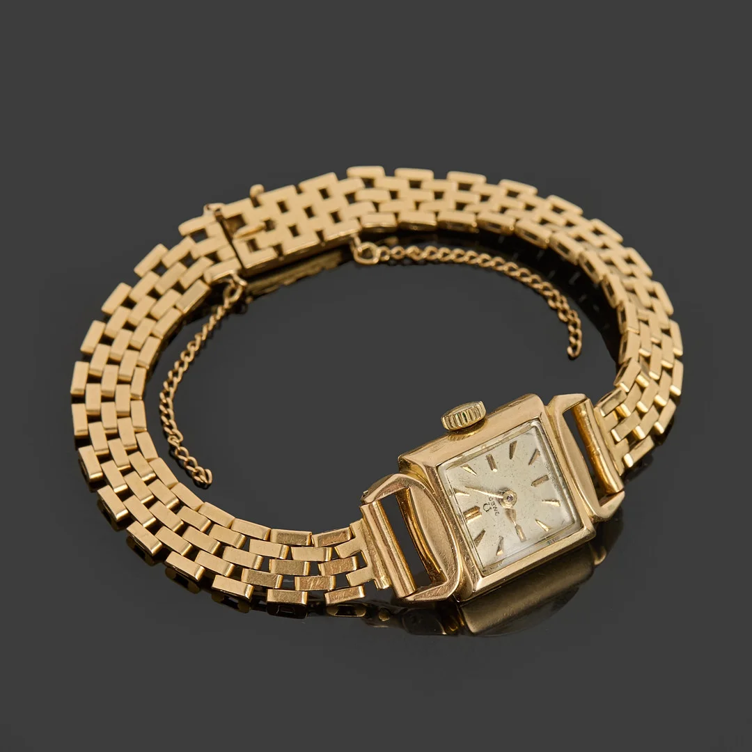 OMEGA, damarmbandsur, ur 14k guld, brick-länk i 18k guld, 1947, Nordguld Ahlberg & Berghman, Stockholm. — Wristwatches — Crafoord Auktioner Stockholm