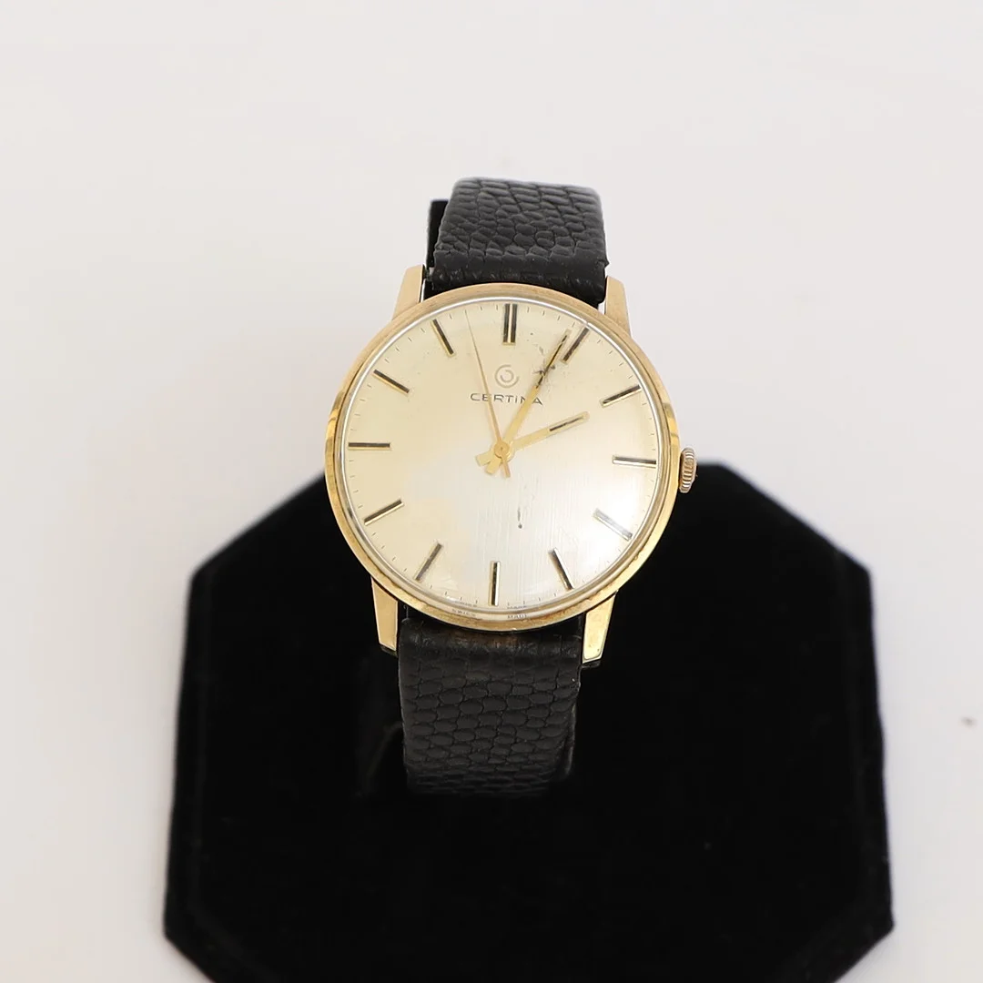 HERRARMBANDSUR, Certina, 14k, guld, armband av läder. — Wristwatches — Falun Auktionsbyrå