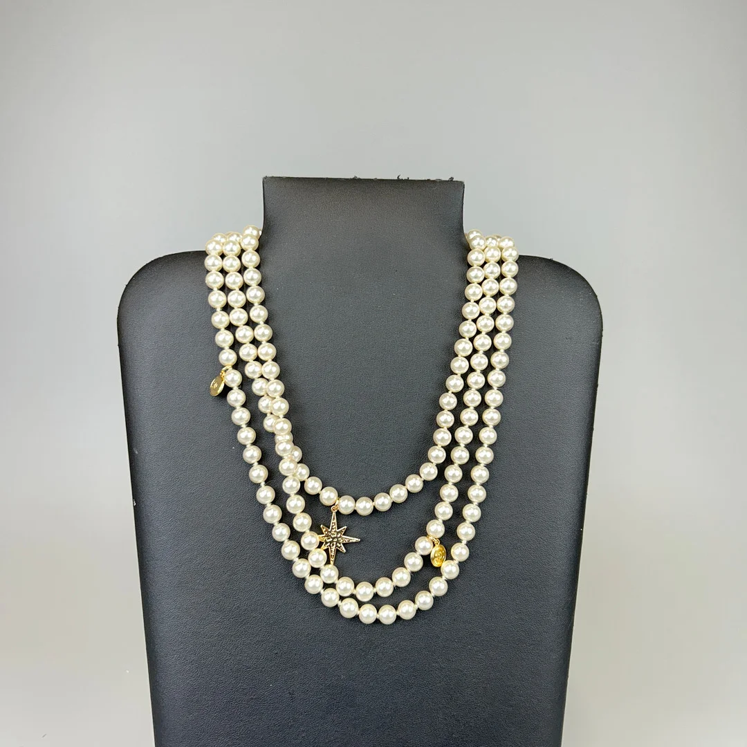 THREE STRAND FAUX PEARL NECKLACE. — Necklace — Chalkwell Auctions