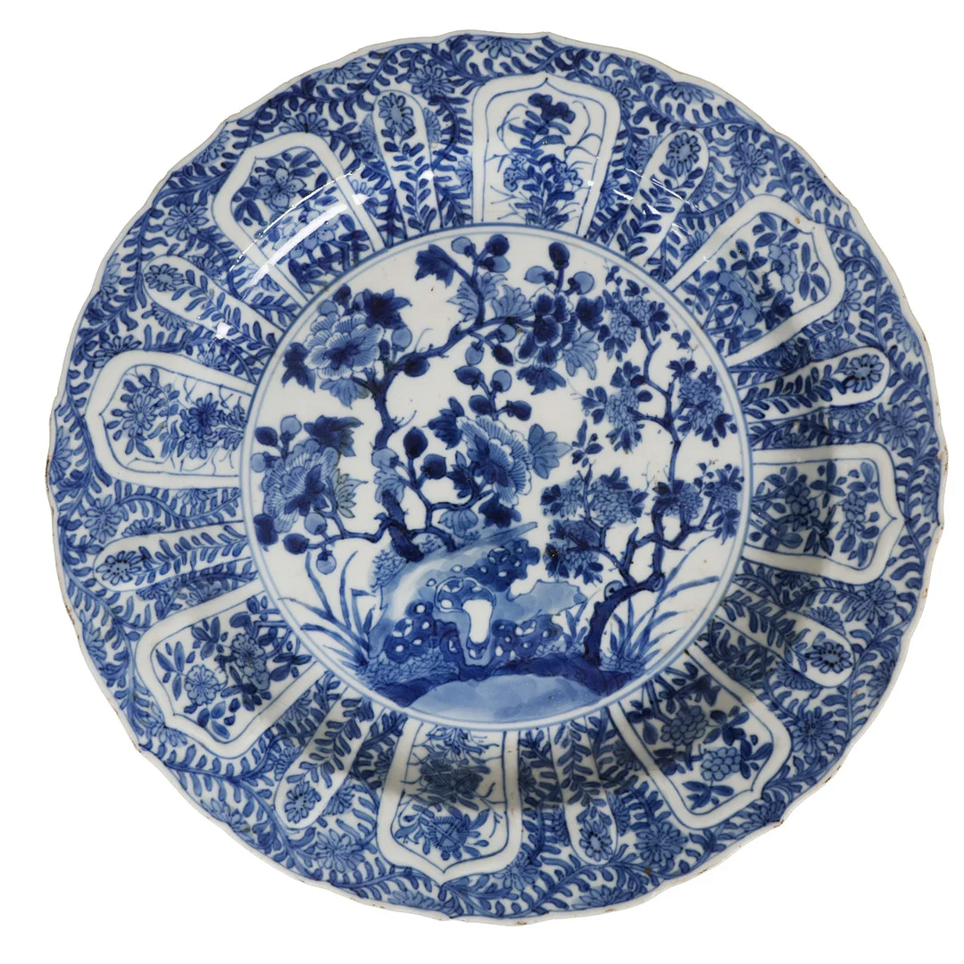 A CHINESE KANGXI (1662–1722) BLUE & WHITE PORCELAIN PLATE. — Ceramics & Porcelain — Bishop & Miller