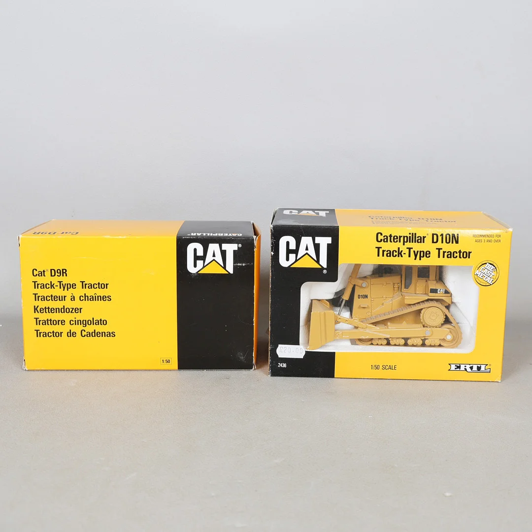 A CAT DIE CAST D9R TRACK TYPE TRACTOR AND AN ERTL CAT D10N TRACK TYPE TRACTOR (2). — Model cars — Bishop & Miller