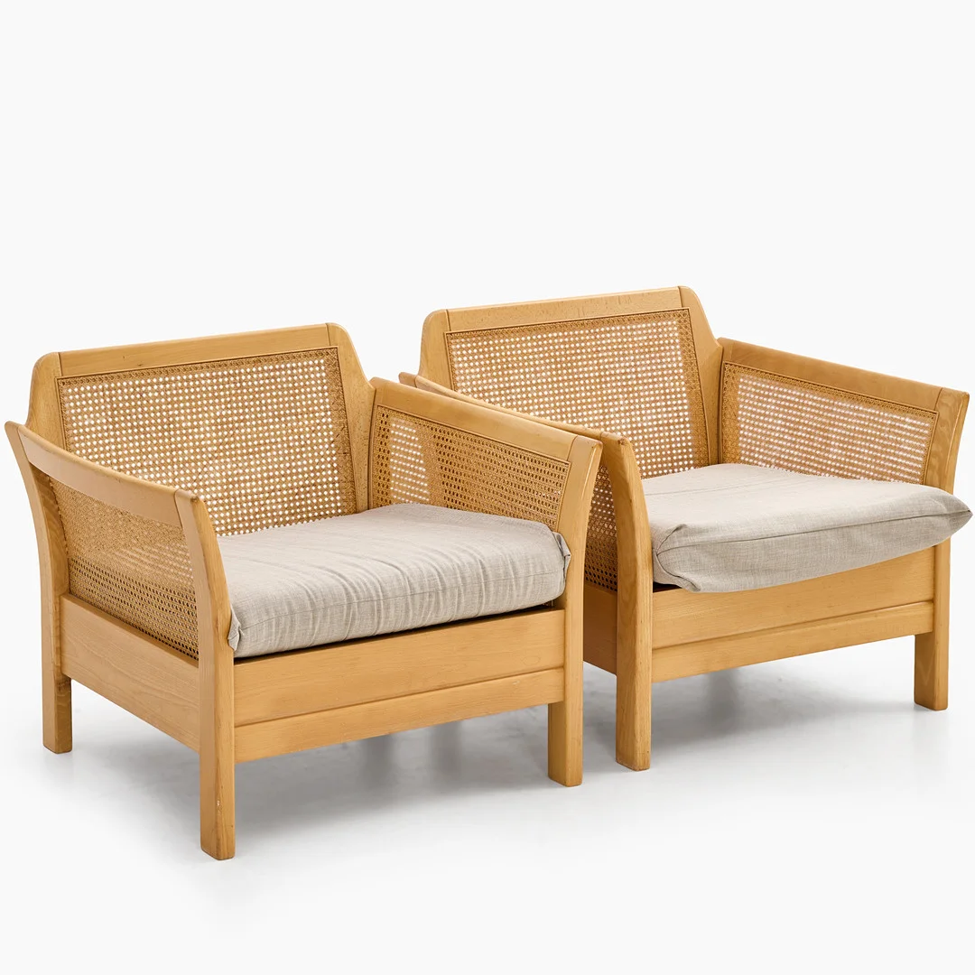 ARNE NORELL. Fåtöljer, ett par ,"Rotang", bok och rotting. — Armchairs & Chairs — Crafoord Auktioner Stockholm