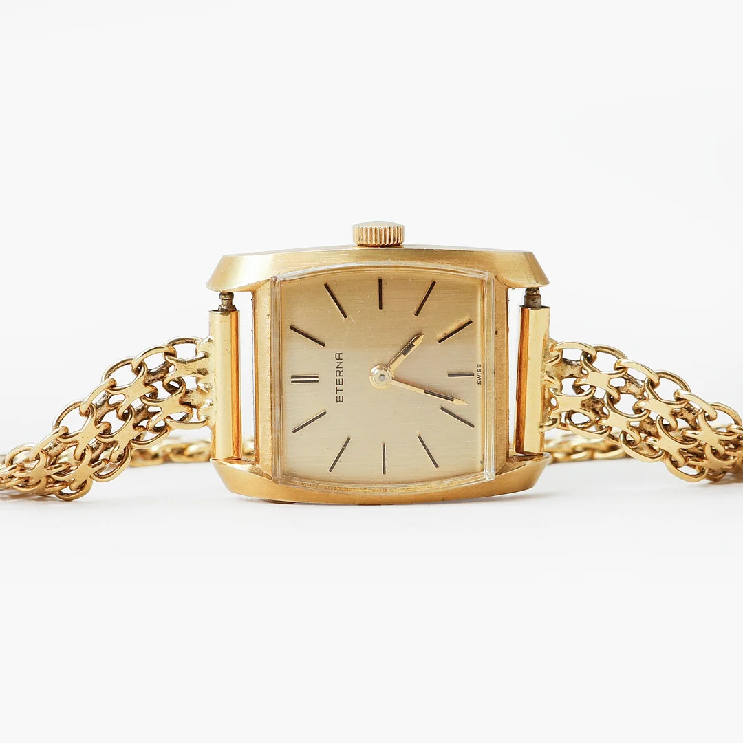 ARMBANDSUR, Eterna, 18k guld i boett och länk, manuell, totalvikt ca 25,4 gram. — Wristwatches — Göteborgs Auktionsverk