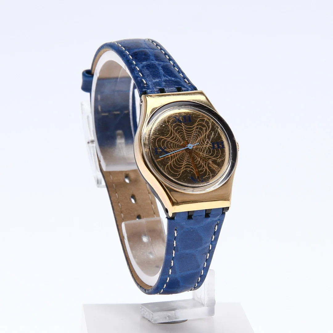 Armbandsur, Swatch, "Boutiqe", metall och läder, 1991. — Wristwatches — Auktionsbyrån Varberg