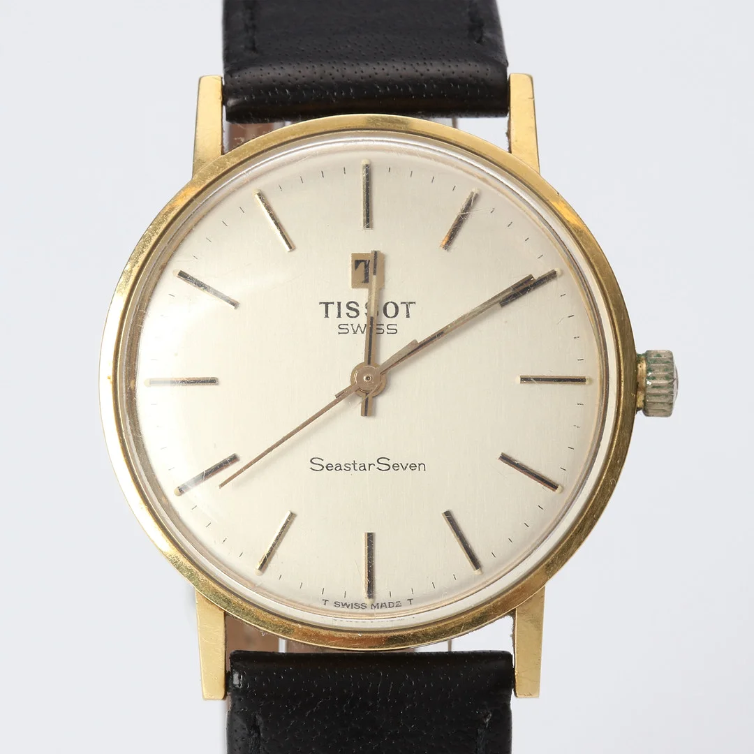 TISSOT SEASTAR SEVEN, ARMBANDSUR. Boett i 18k guld, manuell. — Wristwatches — Skånes Auktionsverk