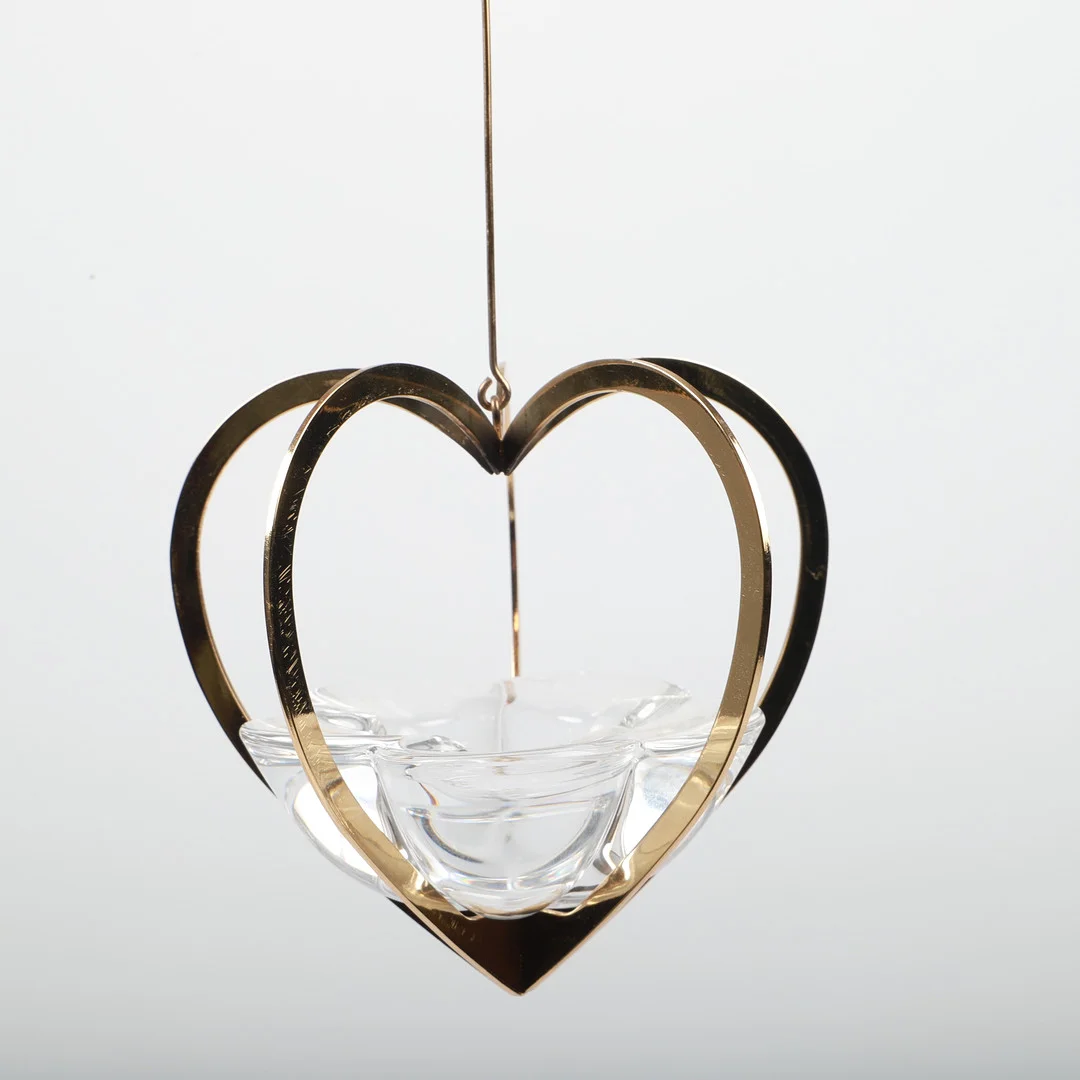 JETTE FRÖLICH. Ljusstakar, 2 stycken, "Golden Christmas", glas/mässing, Holmegaard, Danmark, 2005. — Candlesticks — Helsingborgs Auktionskammare