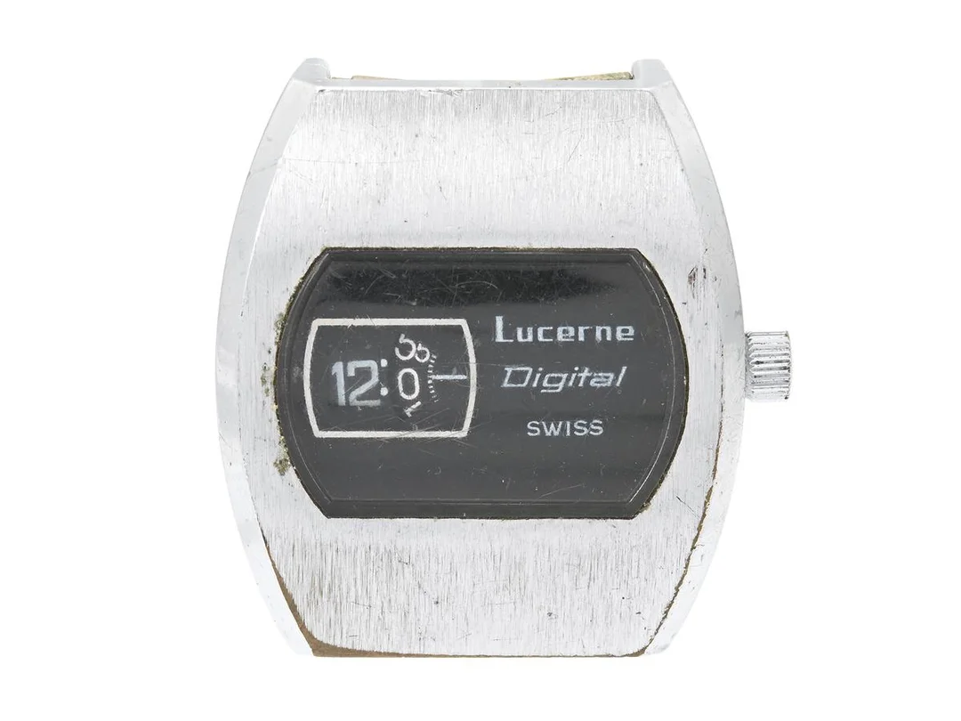 LUCERNE, Digital, Cal BF 582, herrur, 34,5 x 39 mm, vitmetall, manuell, plexiglas, defekt, ca 1970. — Klockor/Övriga klockor — Kaplans