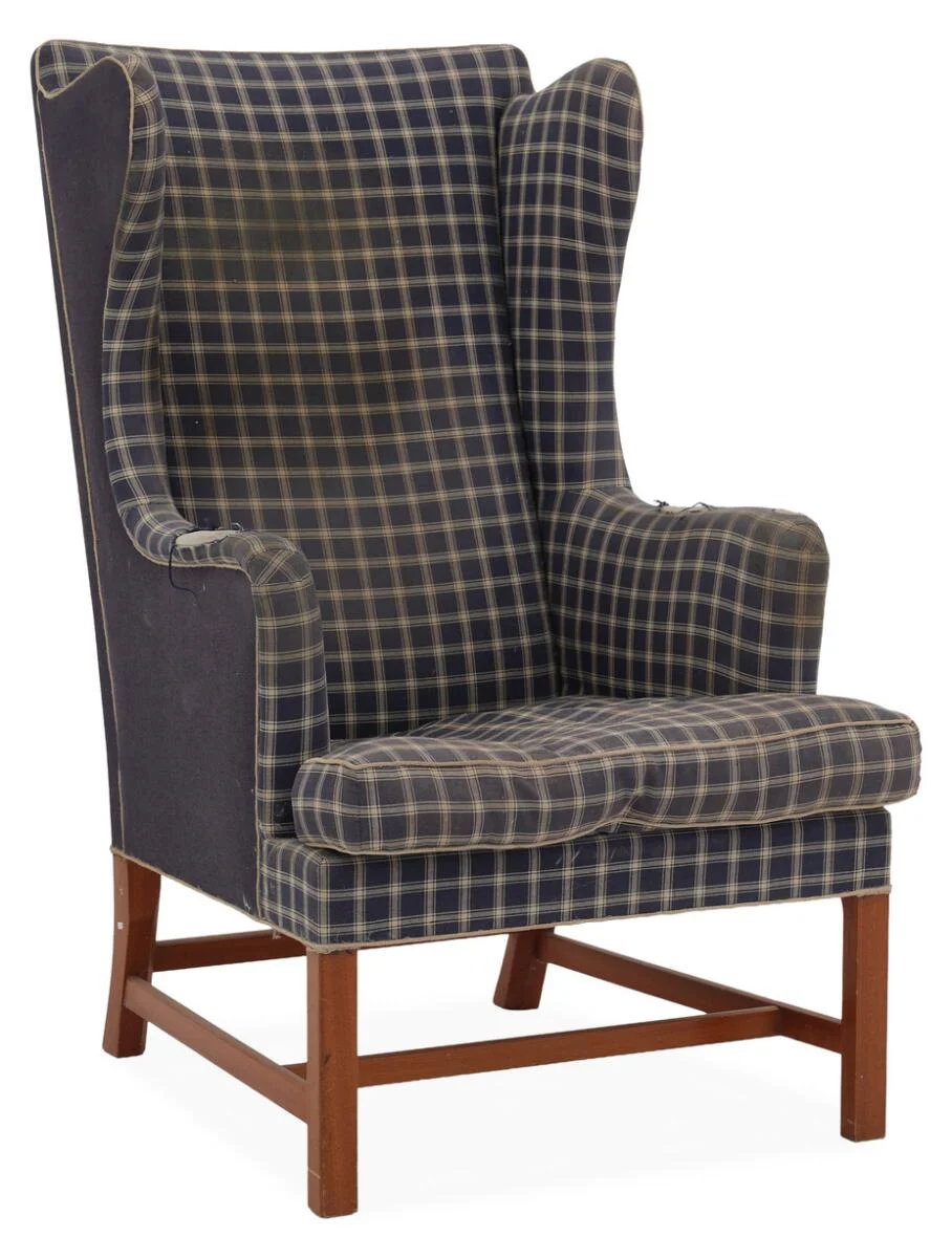 Wing back easy chair of mahogany. Upholstered with original blue and blue checkered Cotil wool. Model 6112. Designed 1941. Made by Rud. Rasmussen Cabinetmakers. — Modern Furniture — Bruun Rasmussen