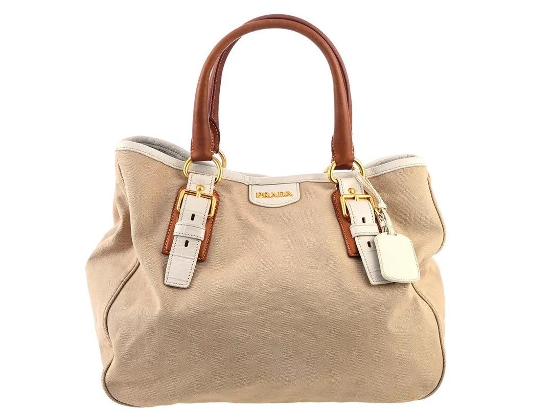 VÄSKA, PRADA, Tote Bag, brunt tyg, brun, vitt läder, guldfärgade beslag, 38x30x19 cm, cert, dustbag. — Accessoarer/Väskor — Kaplans