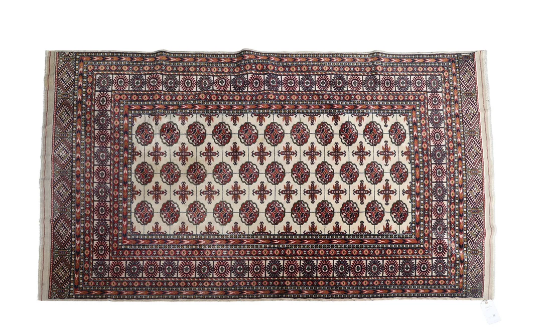 A BOKHARA RUG. — Carpets — Bishop & Miller