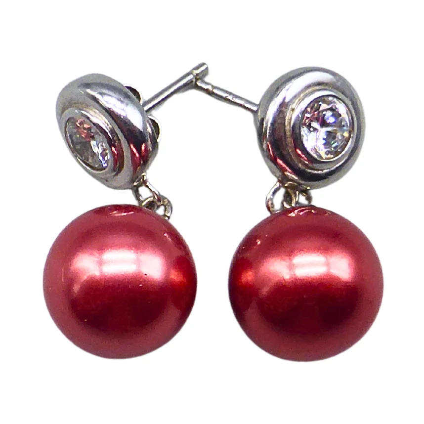 OHRSTECKER AUS 925ER SILBER MIT ROTEN PERLEN UND ZIRKONIA. — Earrings — Auktionshaus Stuber's Hammerschlag