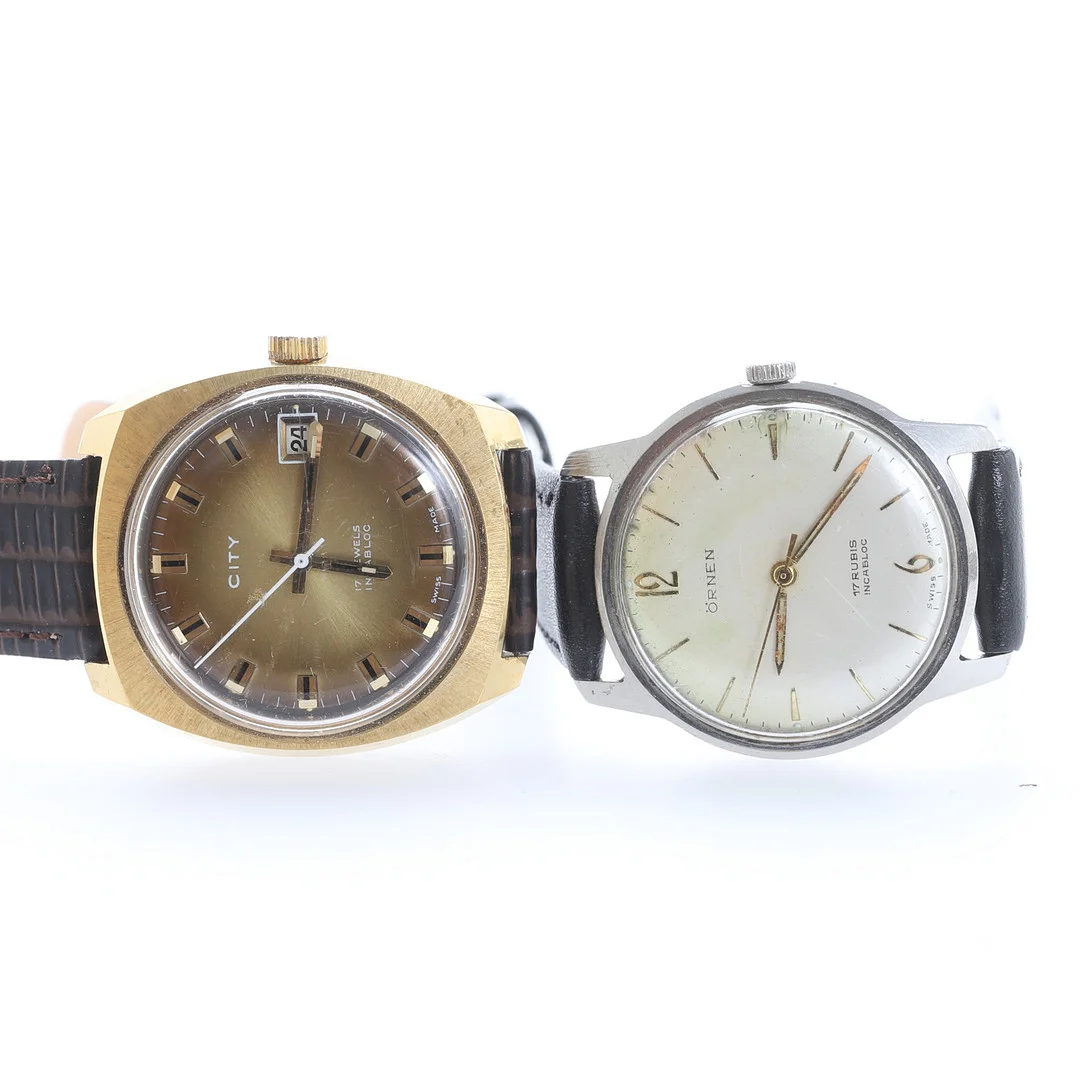 HERRARMBANDSUR, 2 stycken, Örnen och City. — Wristwatches — RA Auktionsverket Norrköping
