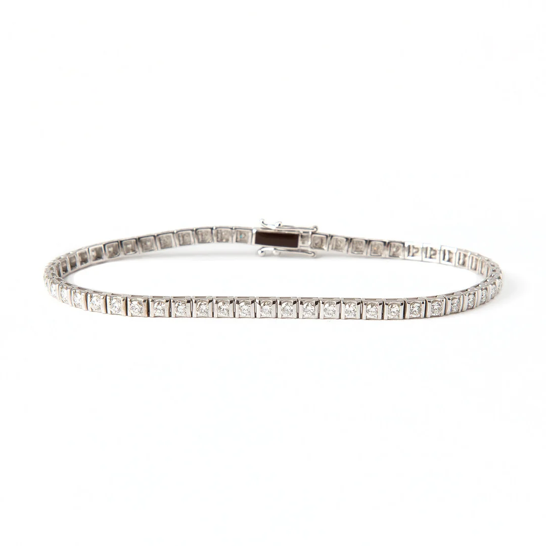 ARMBAND, 18K vitguld med briljantslipade diamanter, totalt 2.10 ct. — Bracelets — Stockholms Auktionsverk Göteborg