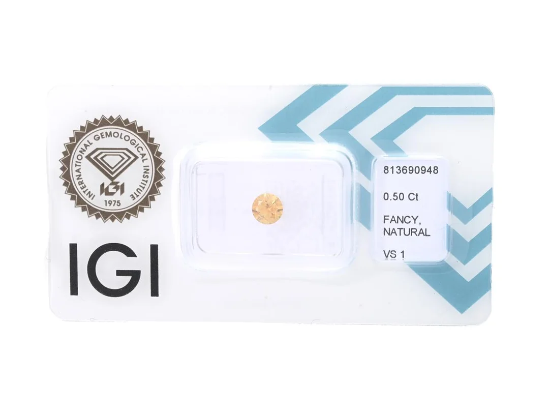 DIAMANT, briljantslipad, 0,50 ct, Fancy Vivid Orangy Yellow/VS1, IGI report 813690948, förseglad. — Ädelstenar/Diamanter — Kaplans