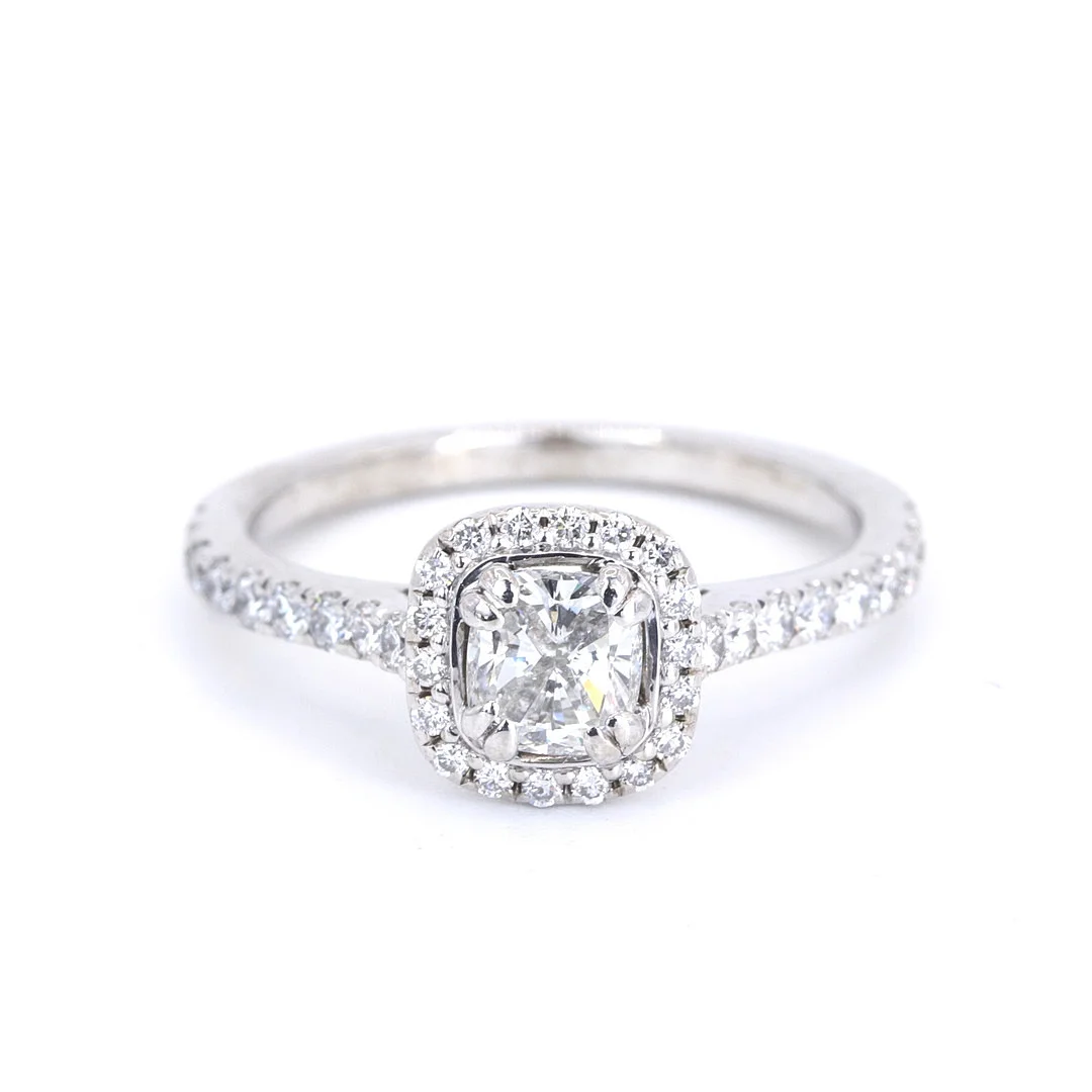 0.9 CT DIAMOND HALO RING. — Rings — Chalkwell Auctions