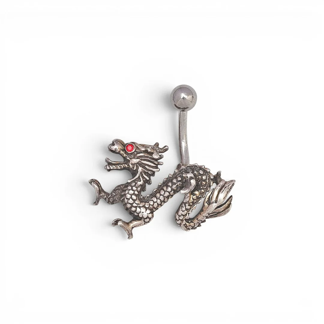 Silver piercing in the shape of a Chinese dragon. — Jewellery — Balclis