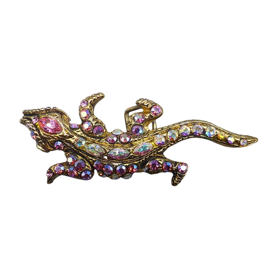 SCHALSCHIEBER IN EIDECHSENFORM MIT STRASSSTEINEN. — Jewellery — Auktionshaus Stuber's Hammerschlag