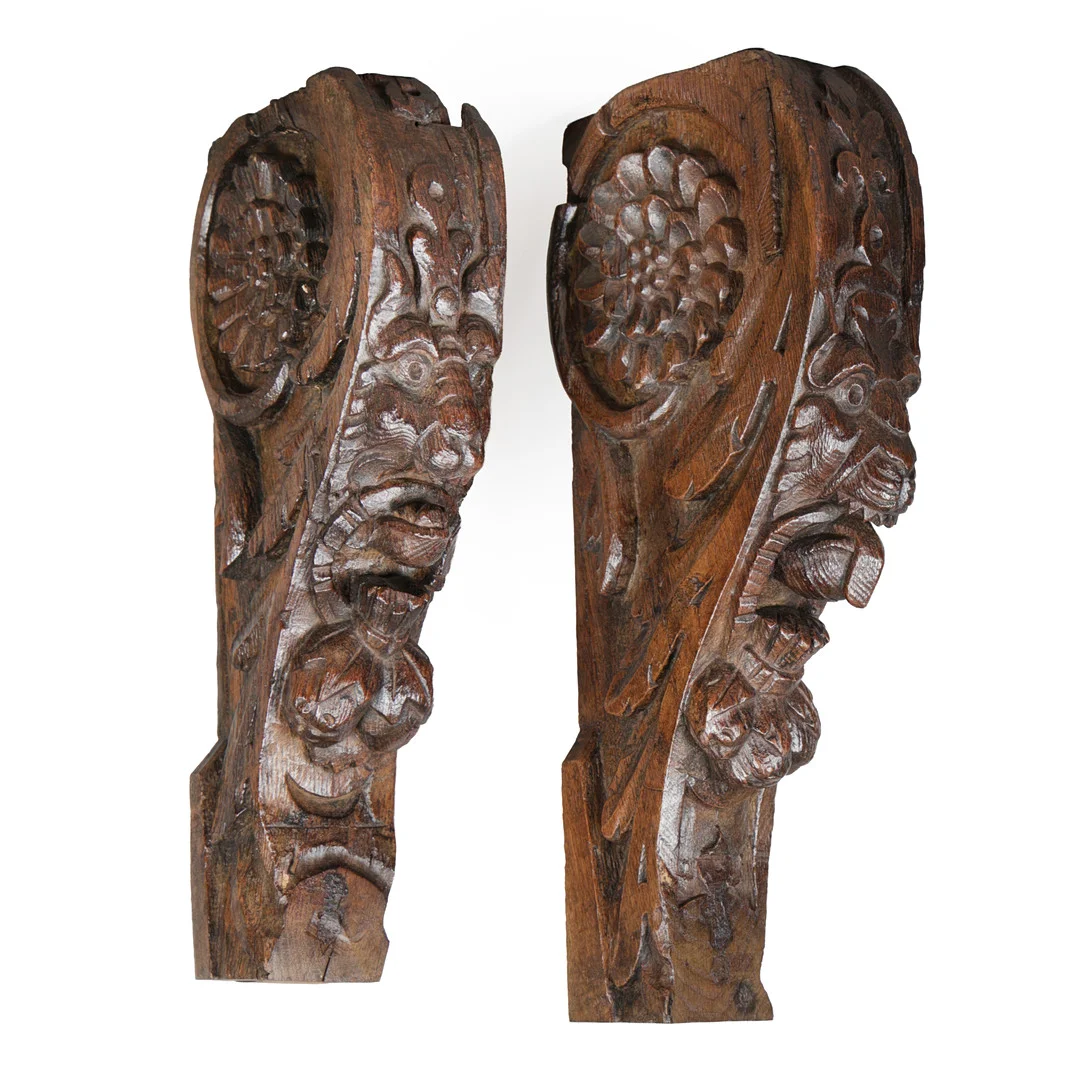 A GOOD PAIR OF EARLY 17TH CENTURY CARVED OAK CORBELS (2). — Other — Bishop & Miller