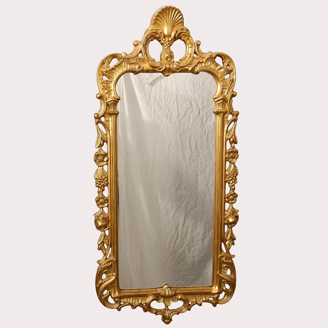 SPEGEL med rikt skuren trädekor, genombruten. Förgylld, bronserad. Rokokostil, 1900-talets andra hälft. — Mirrors — Limhamns Auktionsbyrå